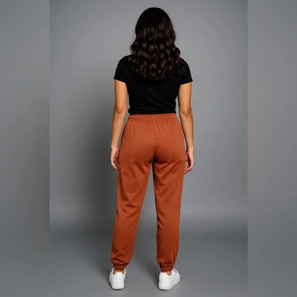 Nike Women’s Rust Orange Sportswear Essential Fleece Joggers Sweatpants Size L - Picture 3 of 17